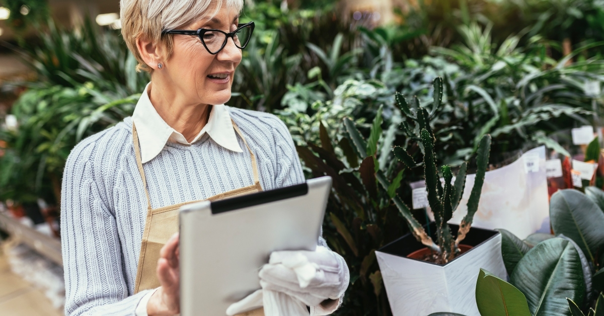 elderly woman in a flower shop