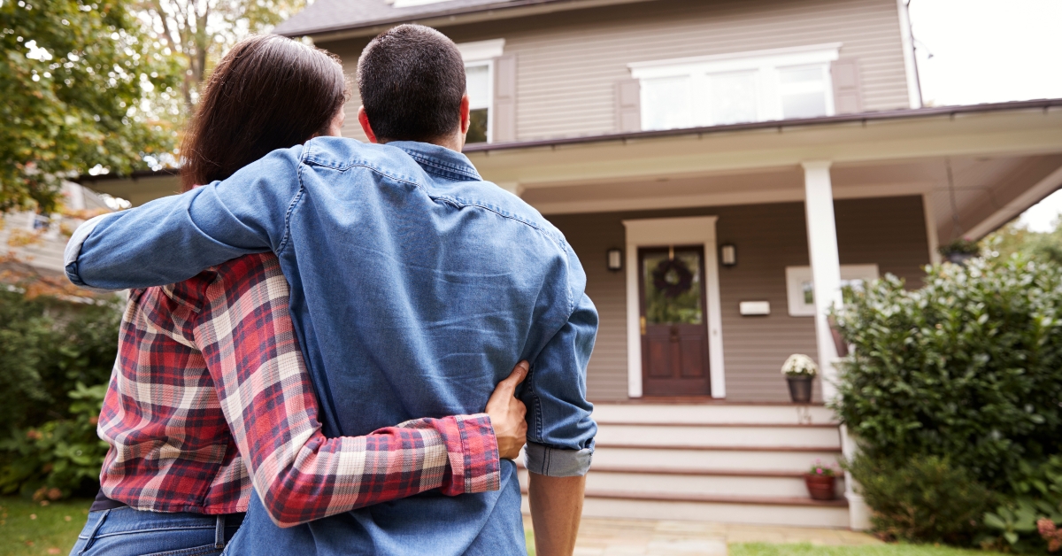 couple looking at house