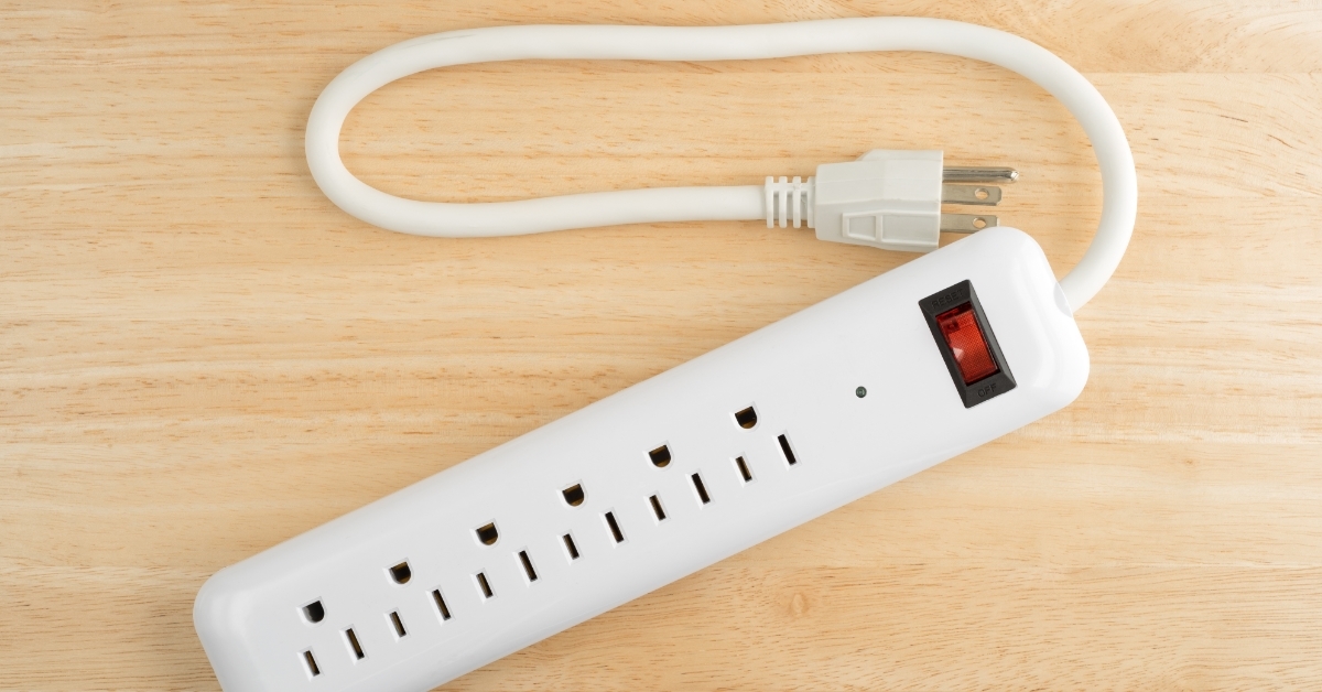 household surge protector on wooden table