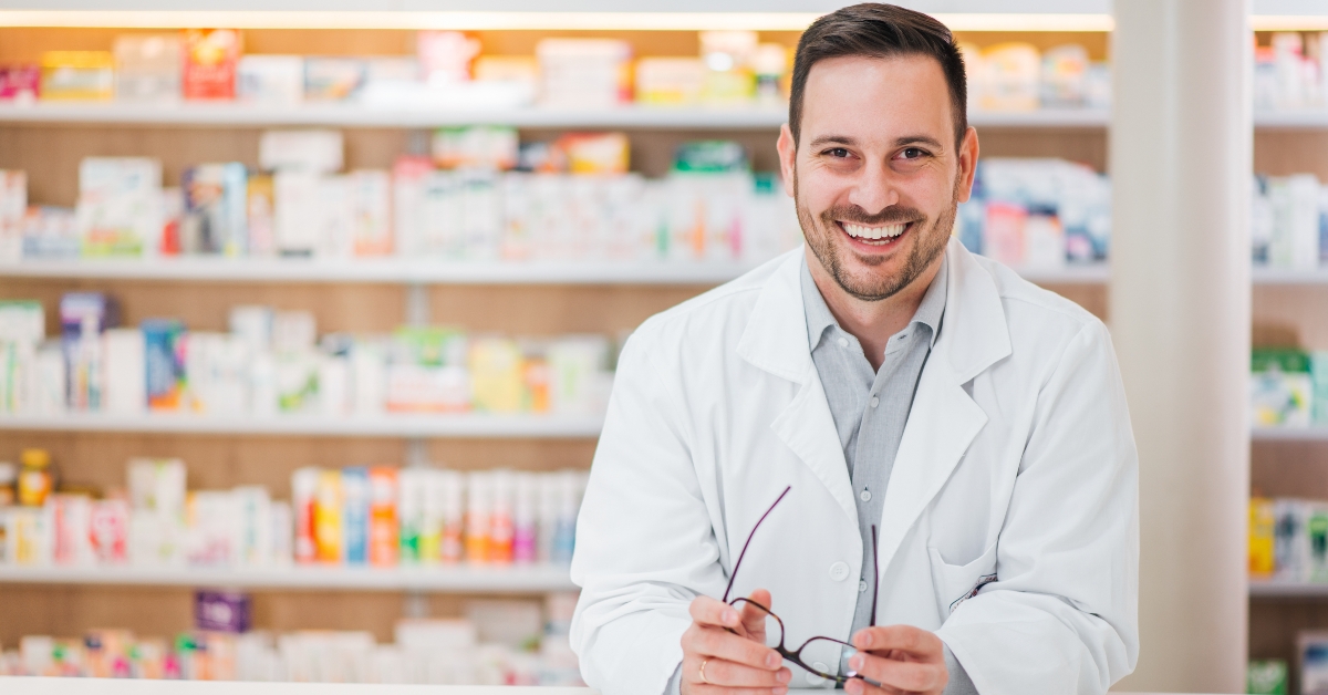  pharmacist leaning on counter