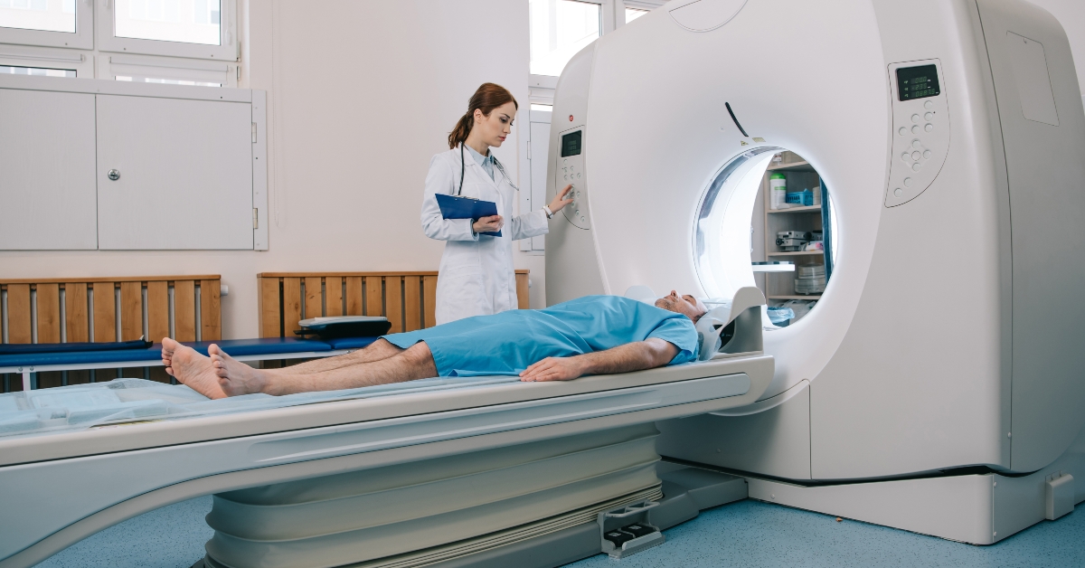  radiographer operating ct scanner
