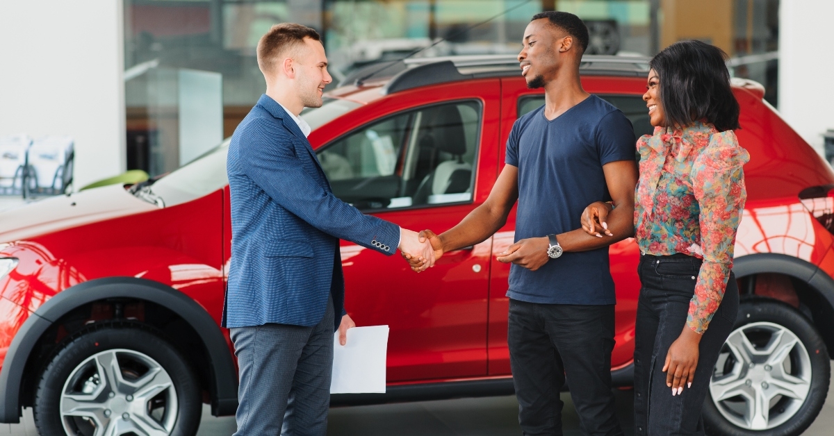couple buying new car