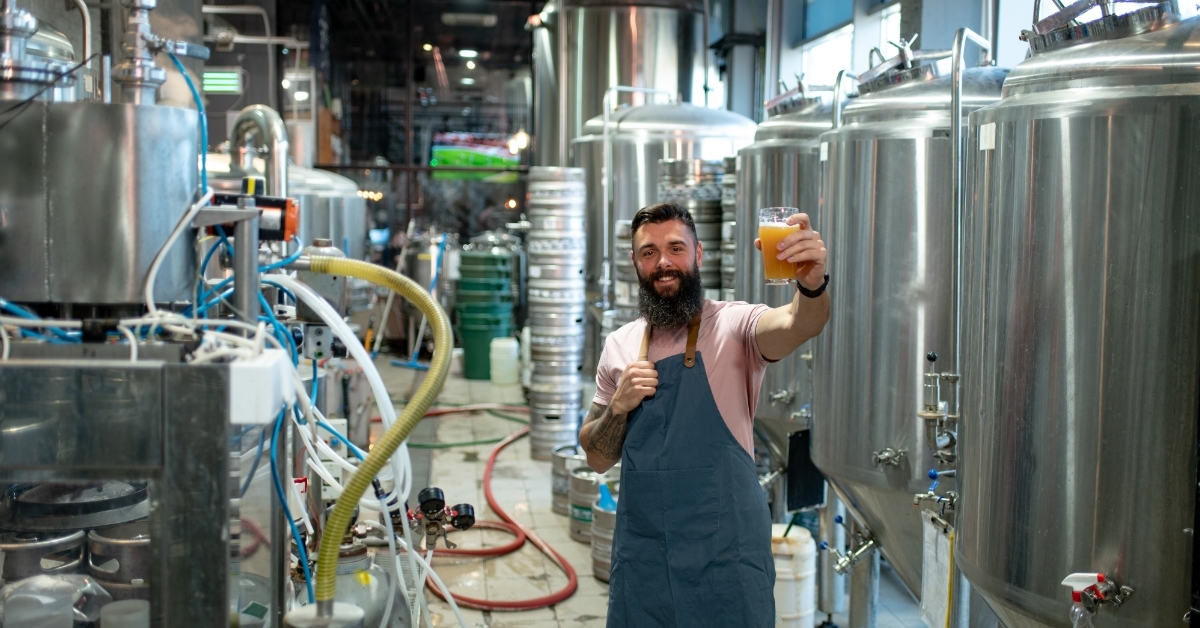 man examining quality of craft beer
