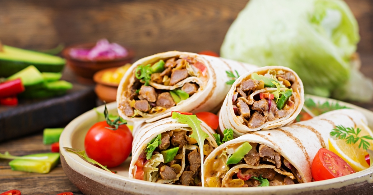 Burritos wraps in wooden bowl