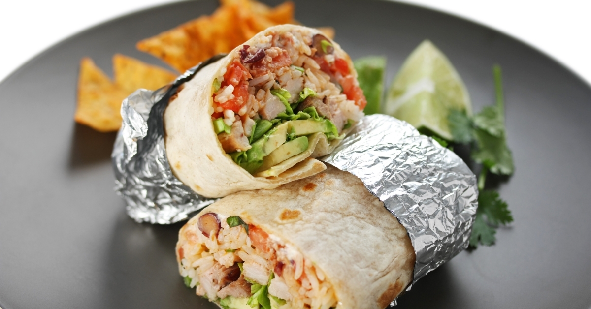 fancy burritos on grey plate