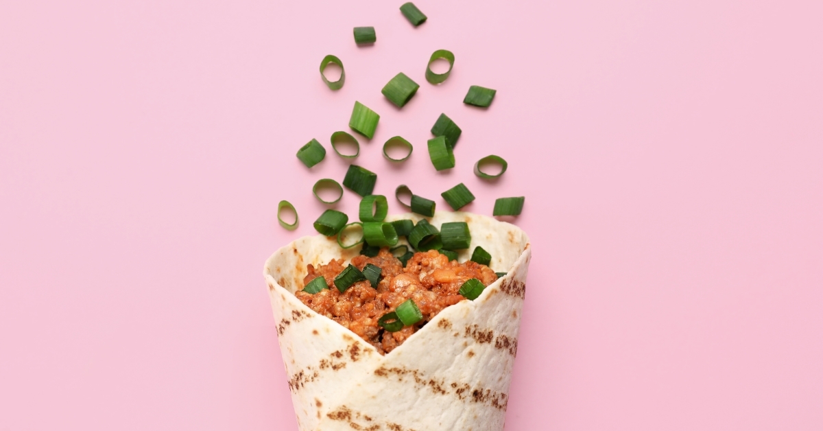 spring onions sprinkled over burrito