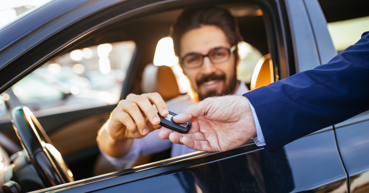 businessman buying used car