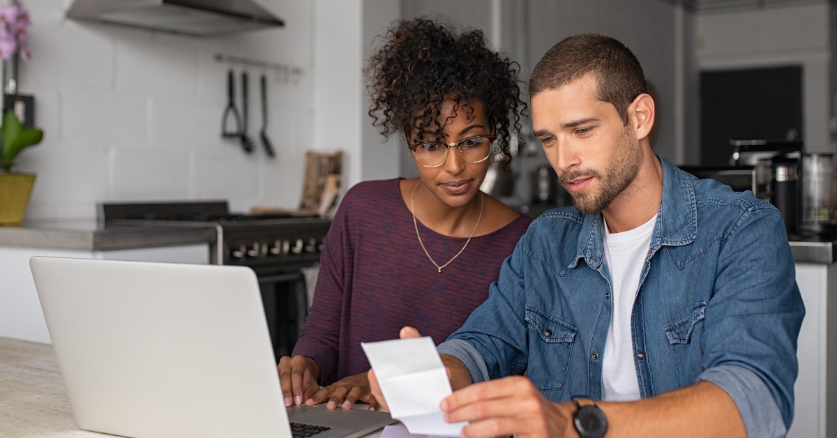 couple examining home finance