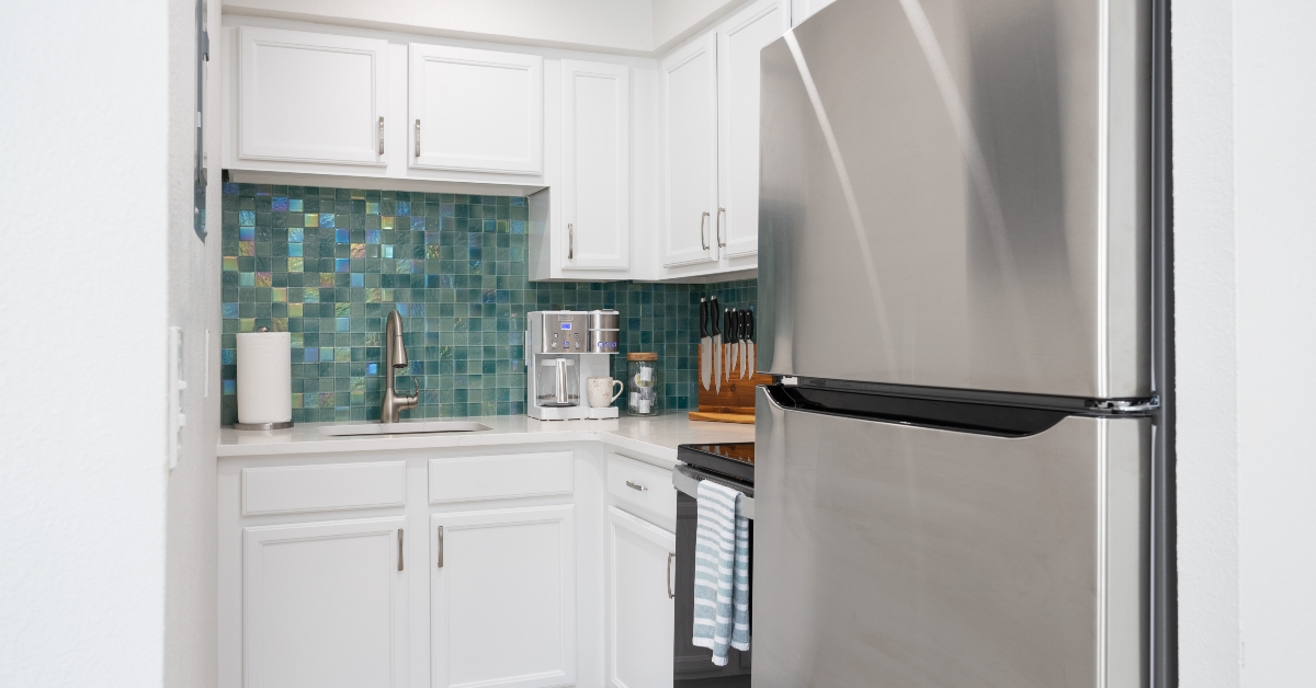 green tiled small kitchen