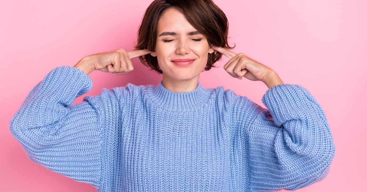 covering ears
