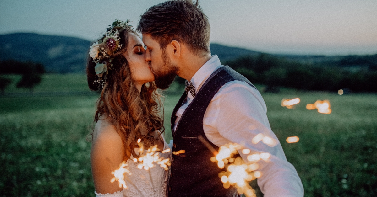 bride and groom with sparklers