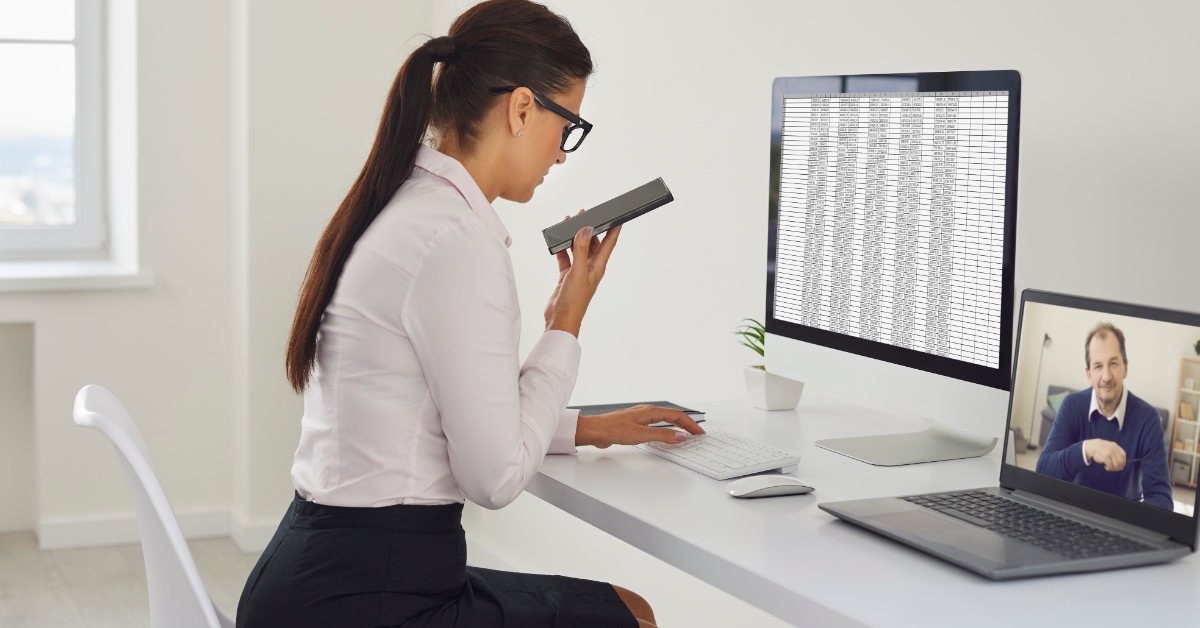 female assistant doing work using computer