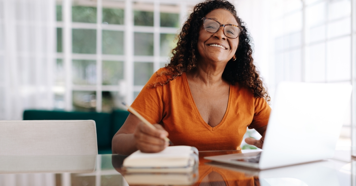 mature woman planning retirement at home