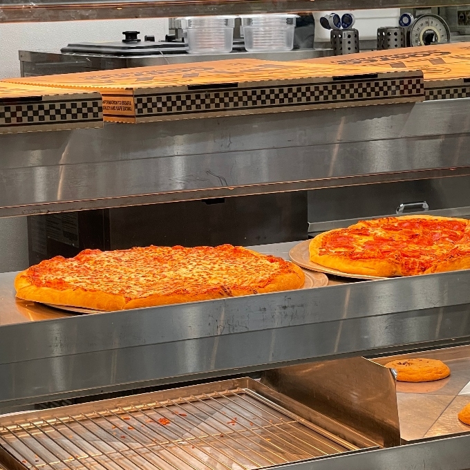 freshly baked pizza ready to dispatch