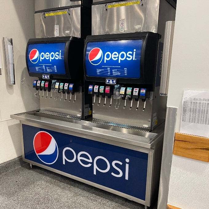 soda dispensers at restaurant