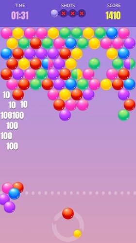 The Bubble Cash game board showing popped and dropping bubbles that score between 10 and 100 points.