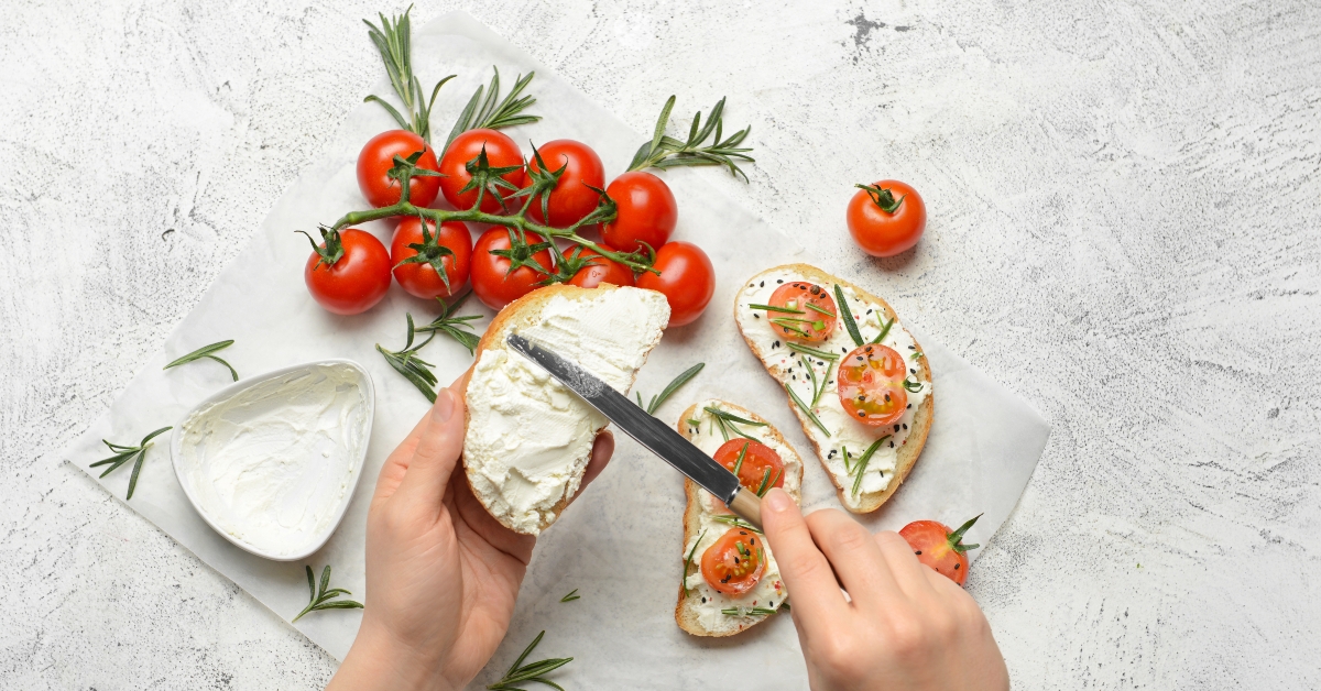 woman making tasty sandwich