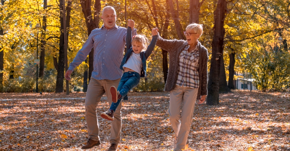 grandparents having fun with granddaughter