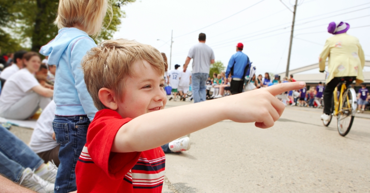 cheerful Boy watching parade