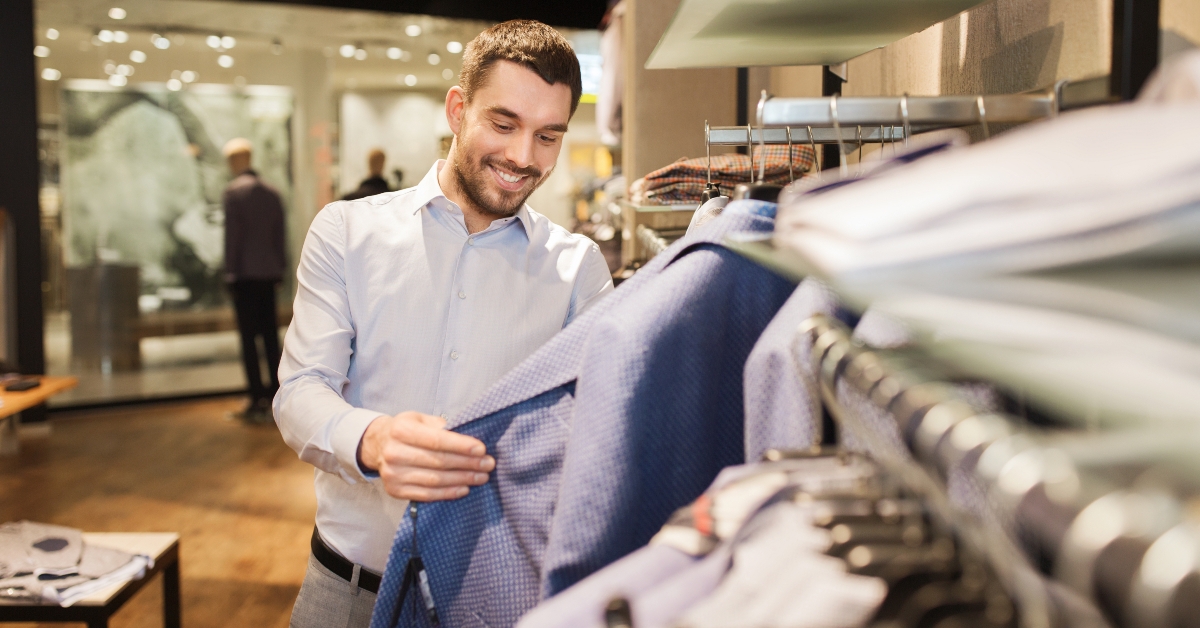 choosing clothes in clothing store