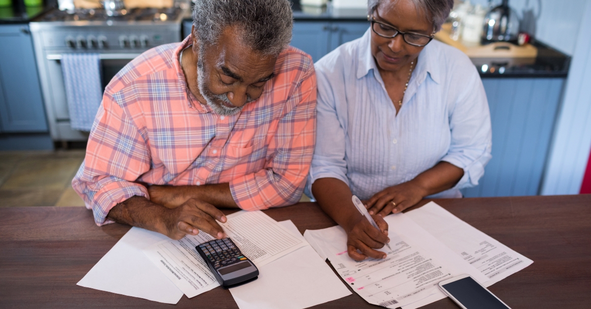 couple using calculator