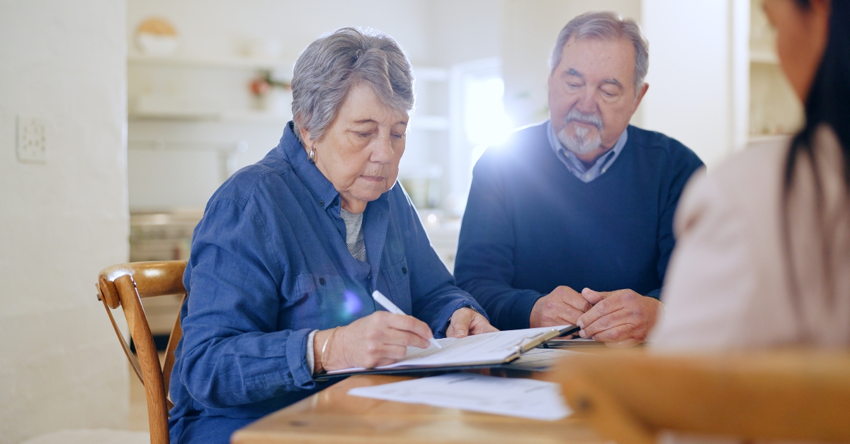 couple with contract to sign