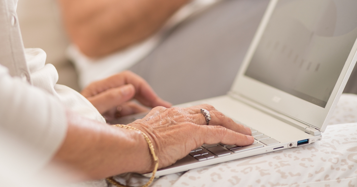 senior female using laptop