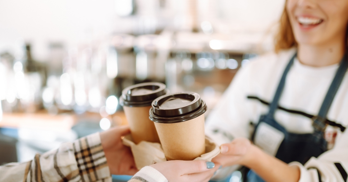 giving take away coffee