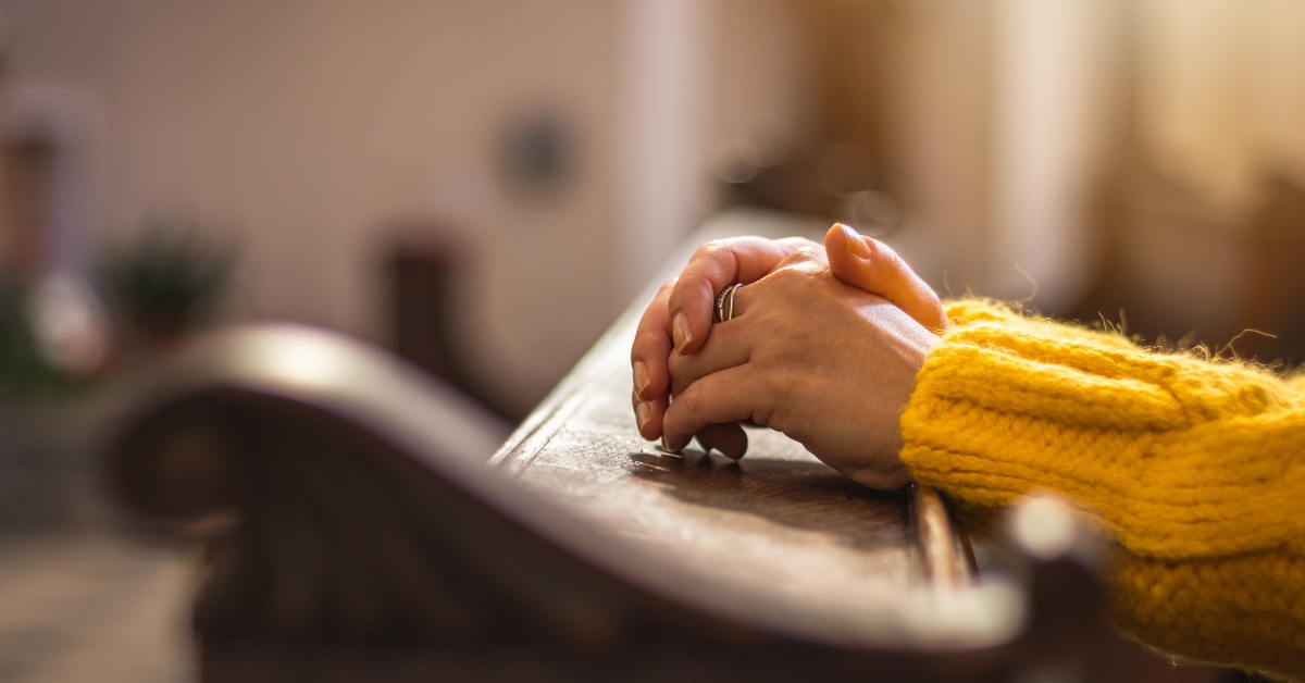 female hands during prayer
