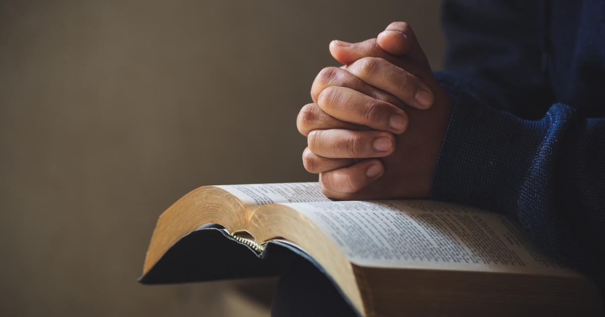 hands on a holy bible