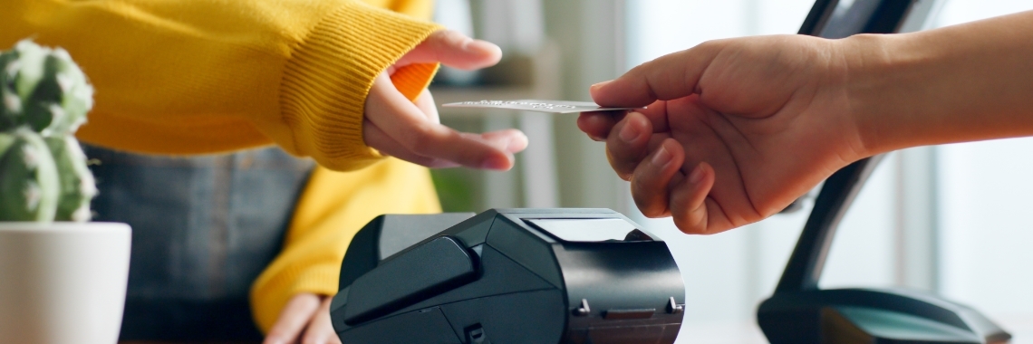 customer paying through card to cashier