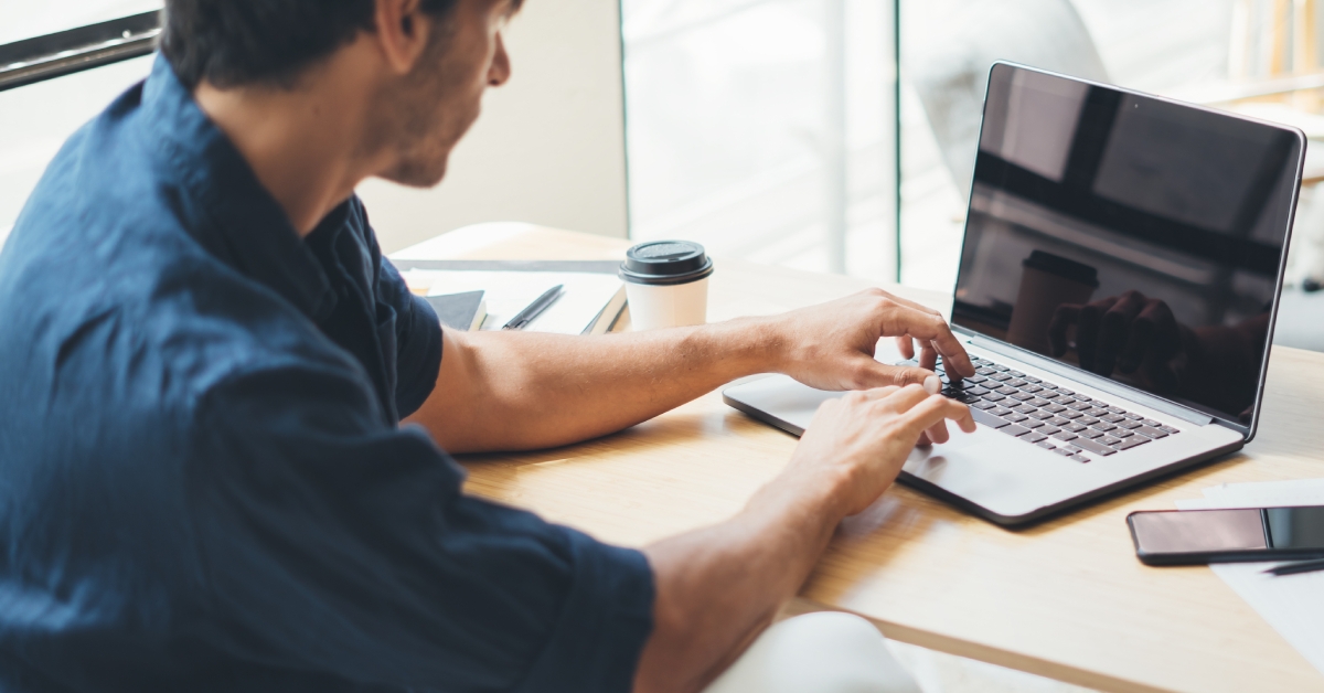 man working on laptop