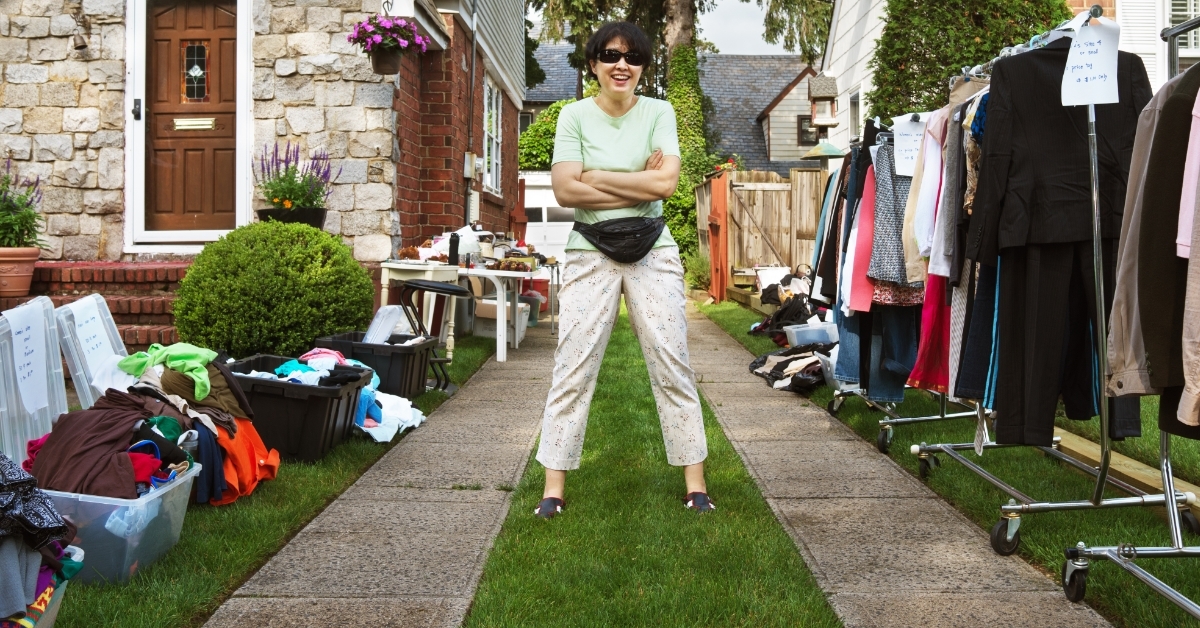 asian woman posing in yard sale