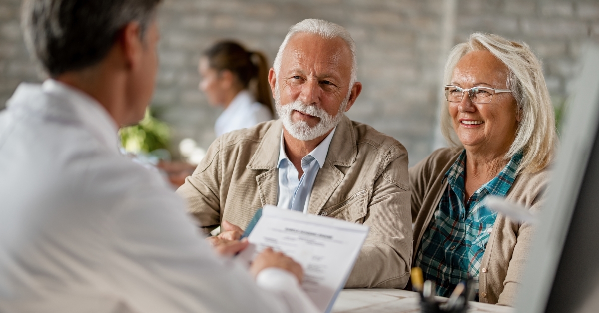 senior couple getting medical insurance