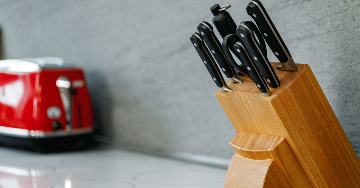 set of knives on stand
