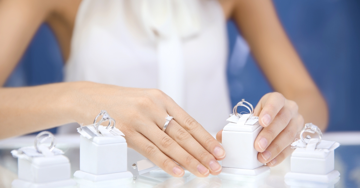 young woman choosing ring