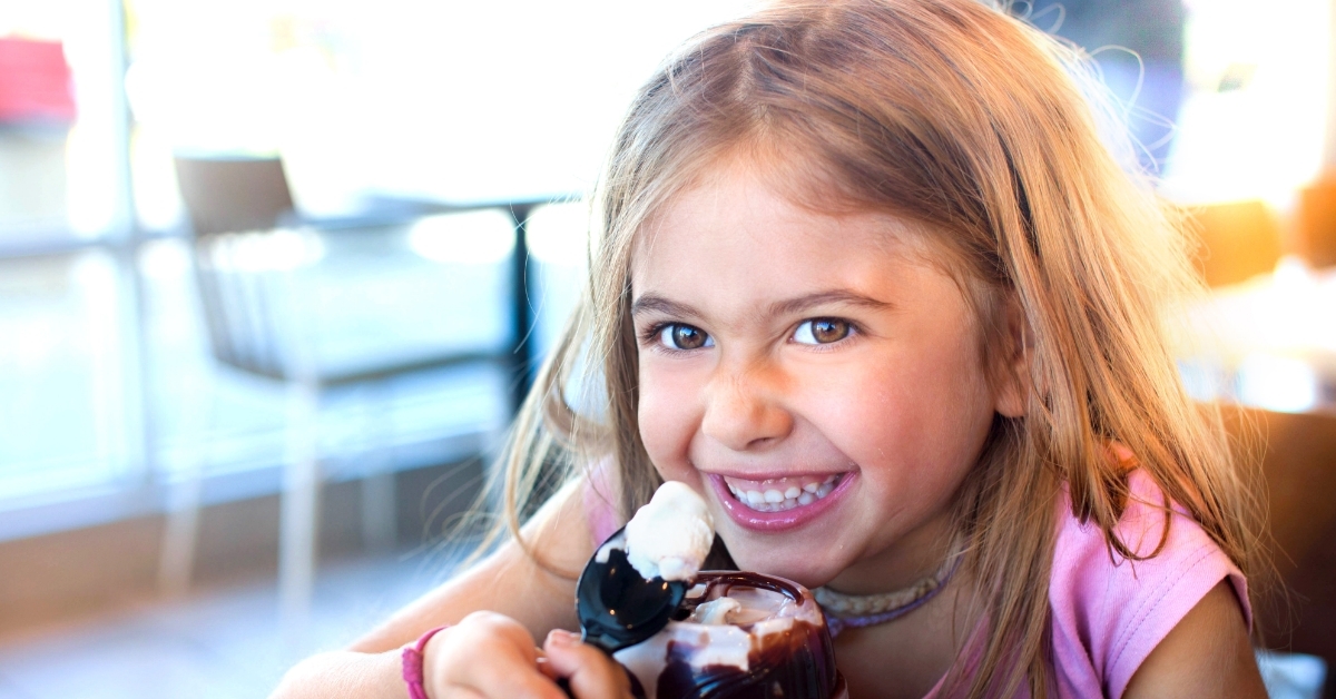 little girl eating mcflurry
