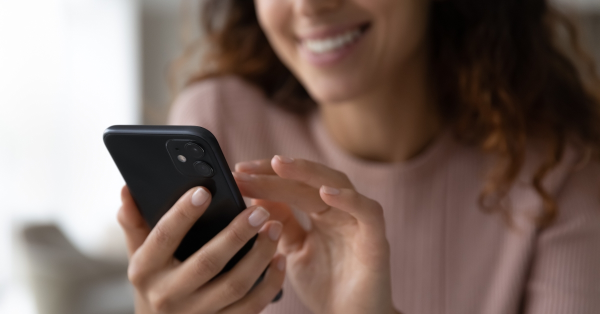 smiling female browse wireless internet