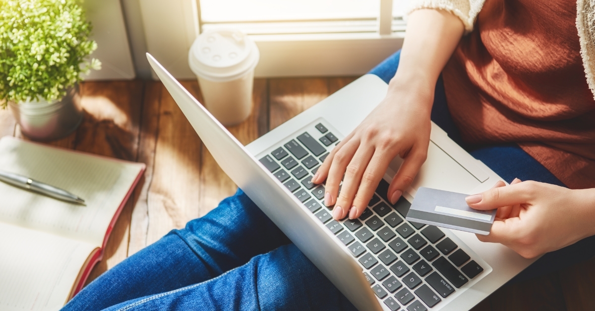 woman shopping online using card
