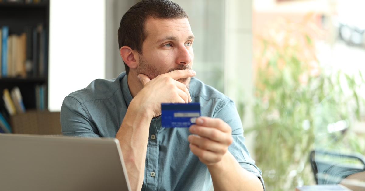 man holding a credit card