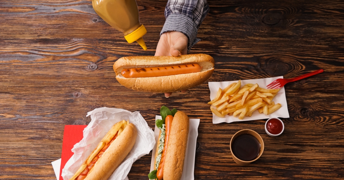 woman squeezing mustard