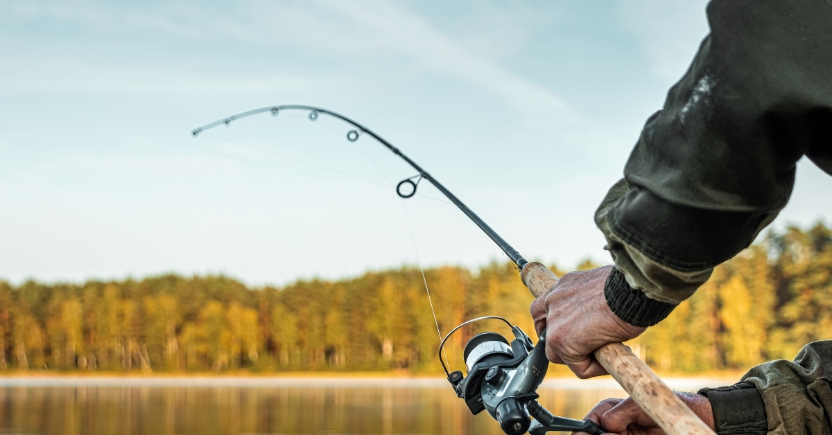 man holding a fishing rod