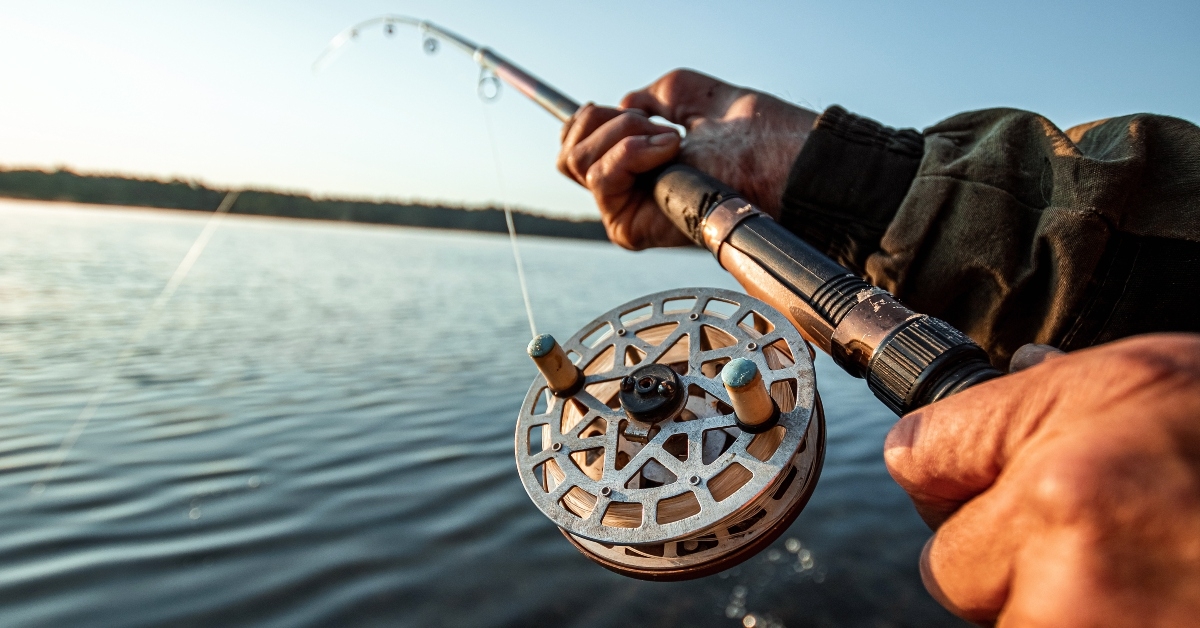 man holding a fishing rod