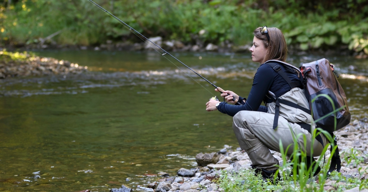 woman learning to fly fishing