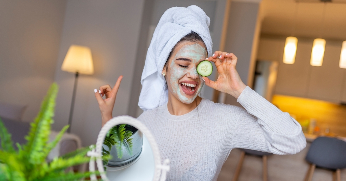 happy woman trying homemade facial masks