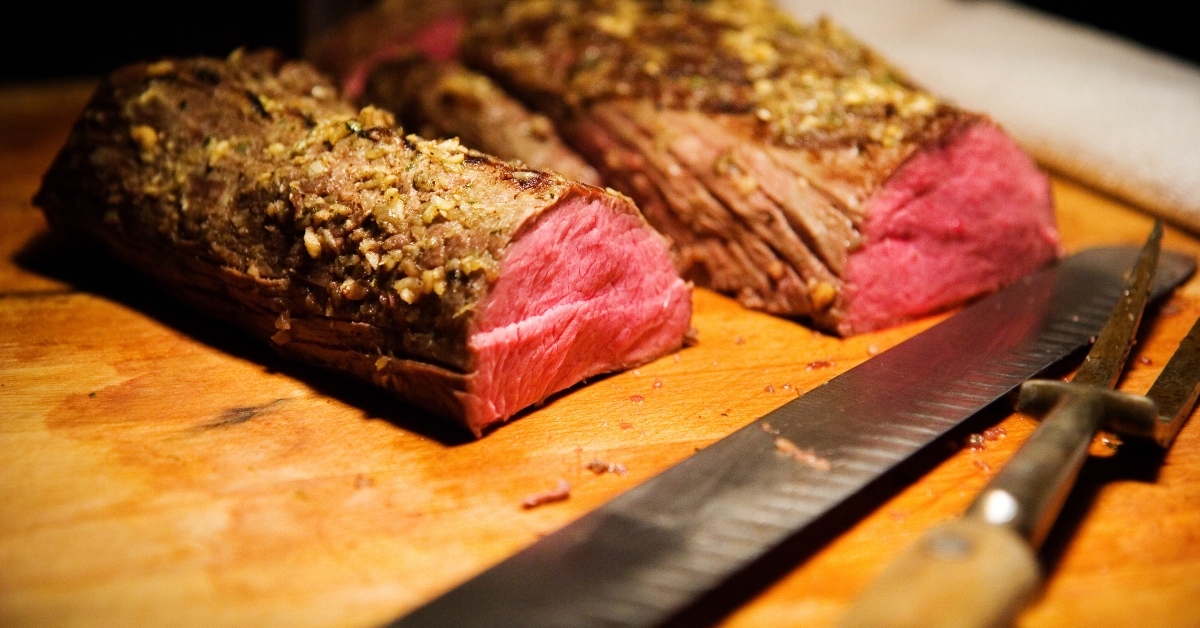 knife and a chopped steak