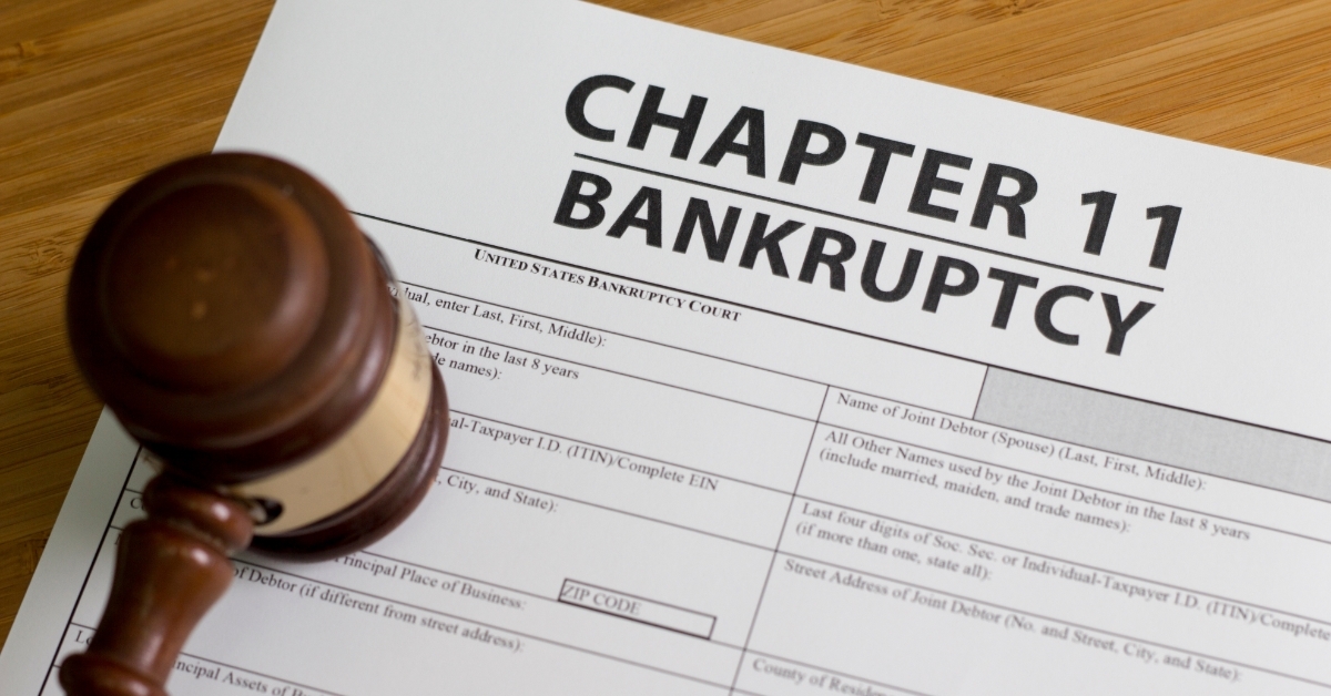 Bankruptcy Chapter 11 form on table
