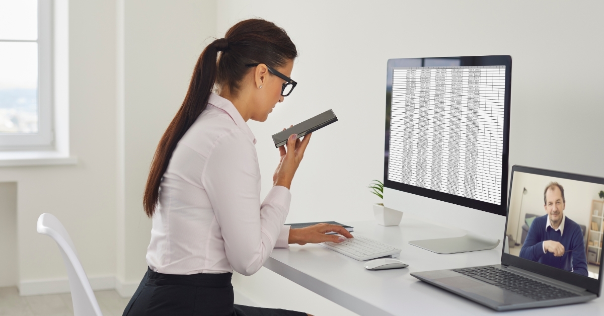 personal assistant working at office desk