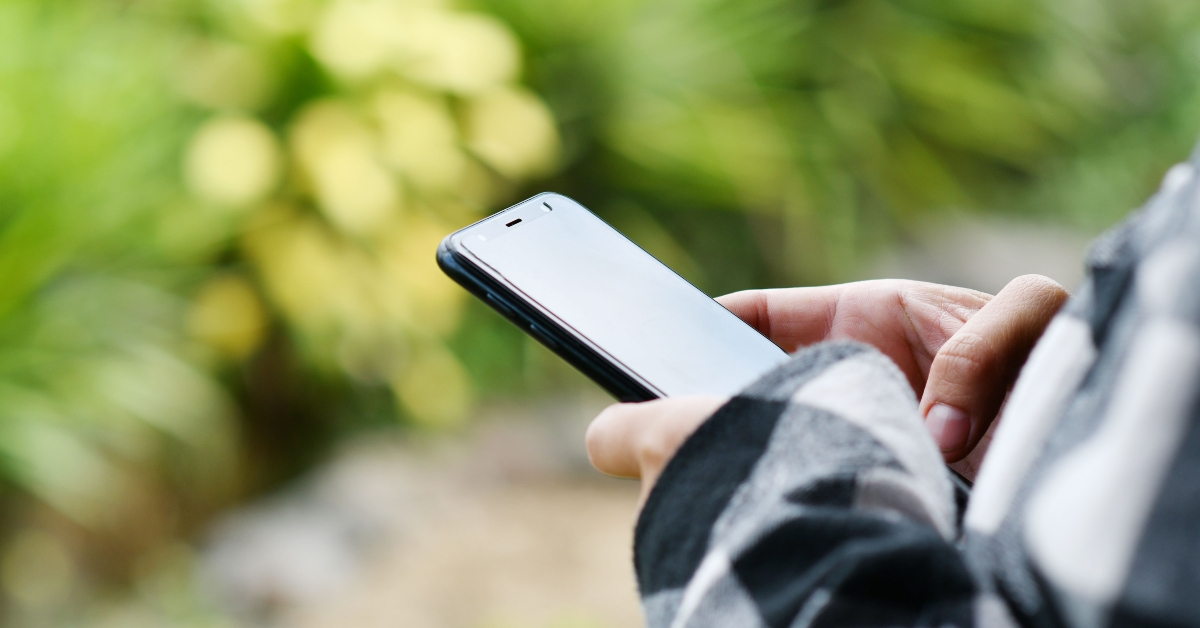 woman holding a phone