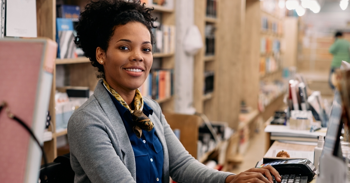 african american librarian using computer